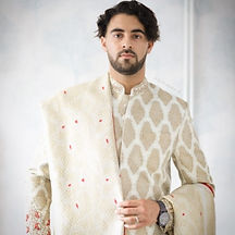 Asian groom wearing his wedding day sharwani